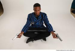 Garson SITTING POSE WITH GUNS